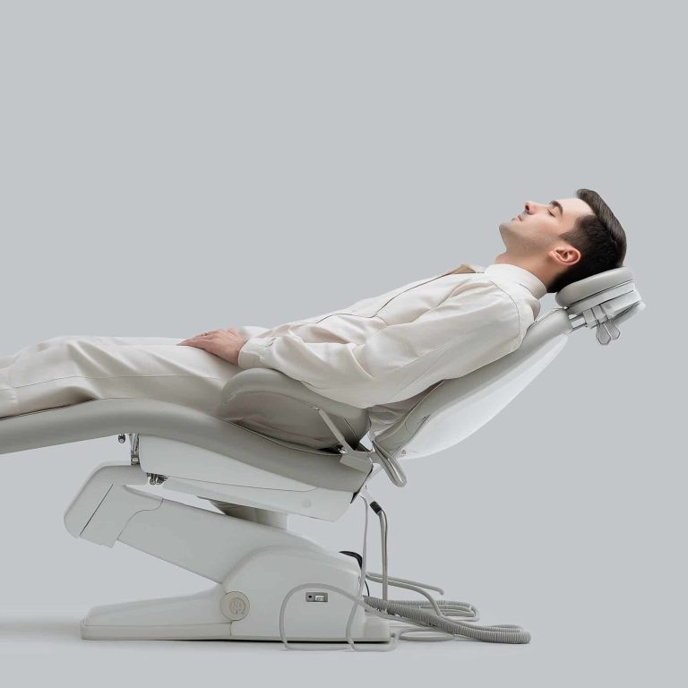 Patient reclining in a dental chair, showcasing a comfortable setting for sedation dentistry at Dr. Chelsea Mason Dental in Bay City, MI.
